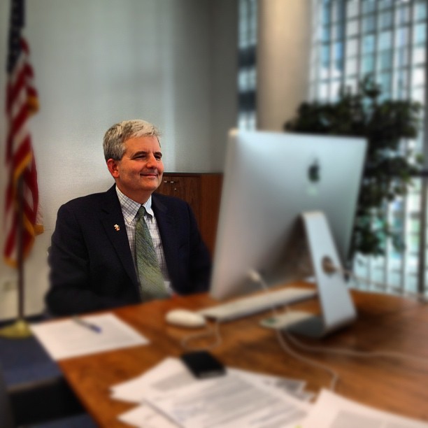 man conducting skype interview