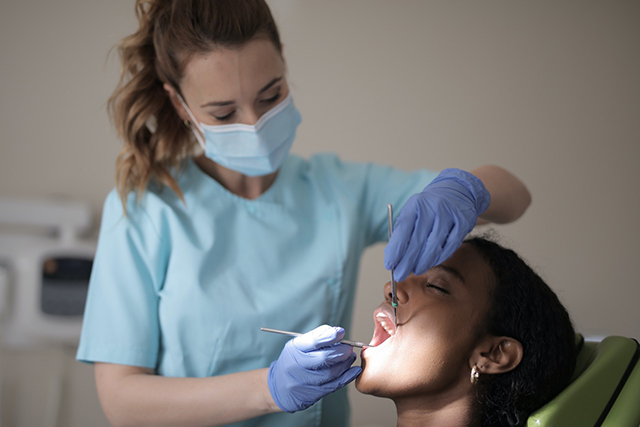 hygienist with scrubs image